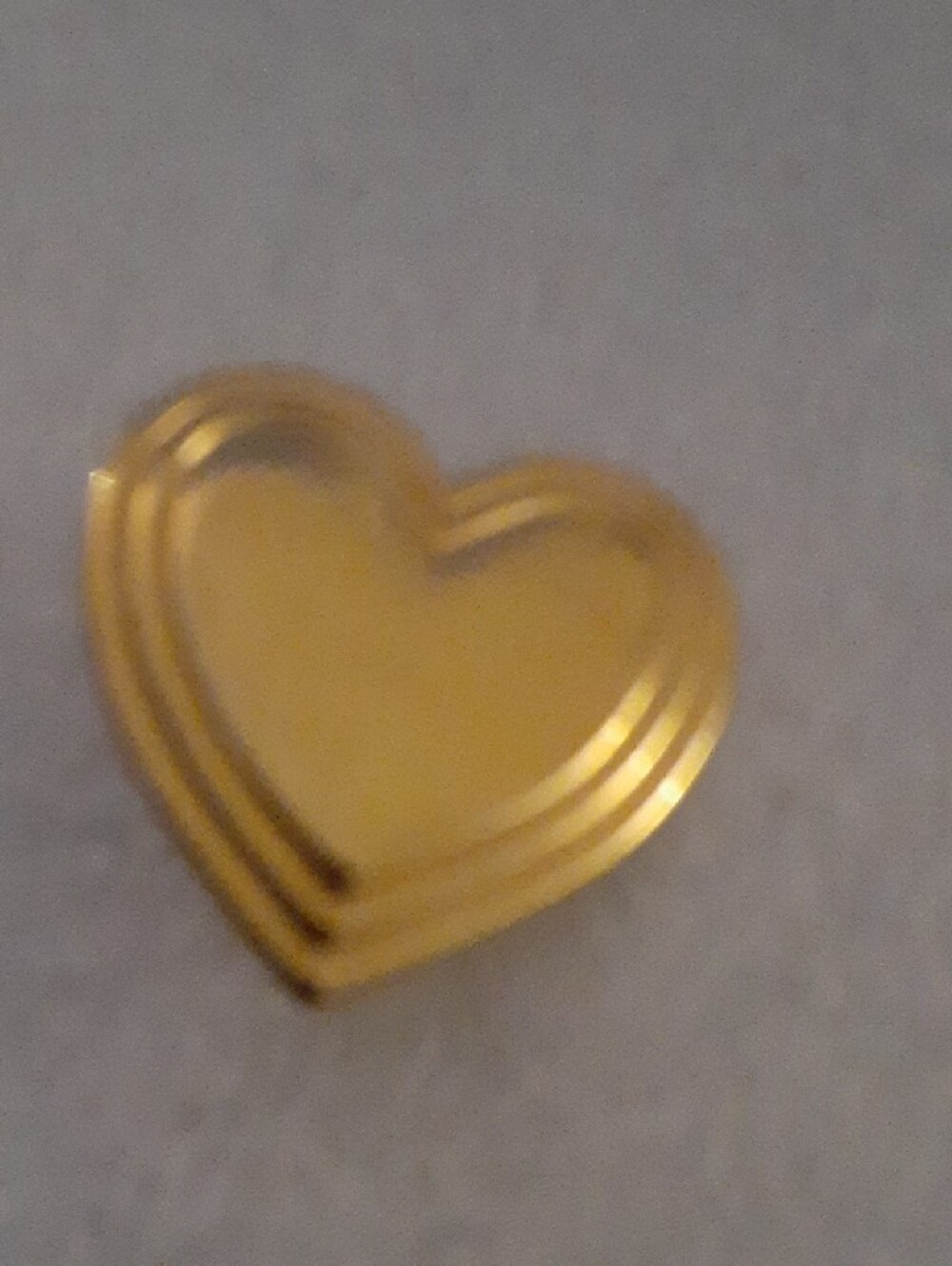 The Variety Club Gold Heart Pin with Club Logo